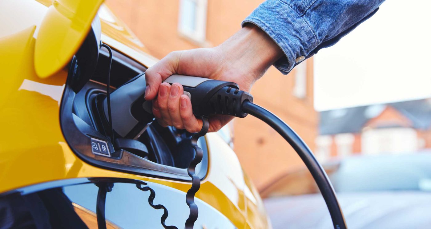 Yellow Electric Car Charging At Home ConnectEV FAQ