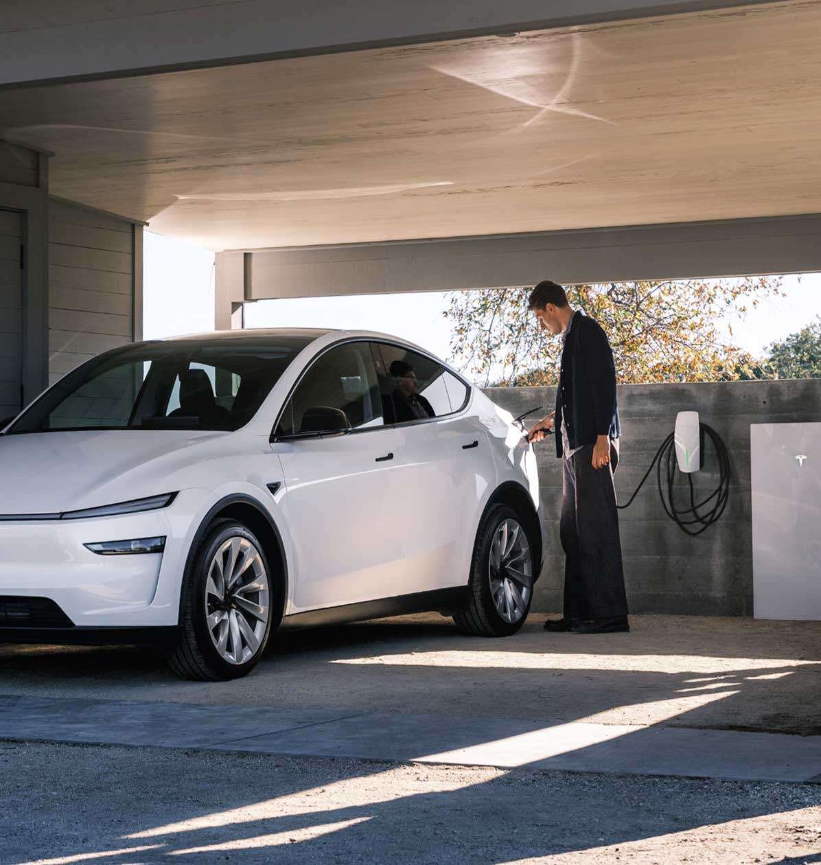 Tesla Wall Connector installed by ConnectEV in a South Florida garage